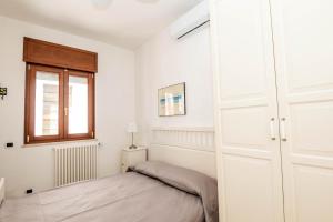 Postel nebo postele na pokoji v ubytování Sosandra Rooms