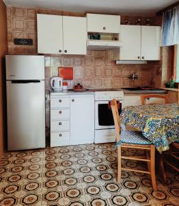 Кухня или кухненски бокс в Apartman LEMON