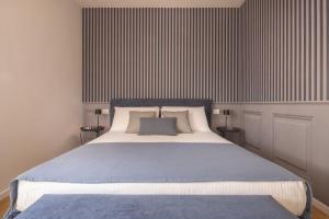Letto o letti in una camera di Santa Croce Design Apartment R&R
