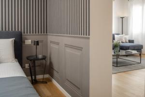 Letto o letti in una camera di Santa Croce Design Apartment R&R