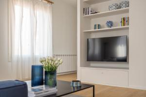 TV o dispositivi per l'intrattenimento presso Santa Croce Design Apartment R&R