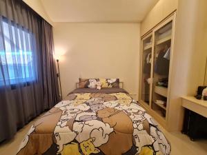 Cama o camas de una habitación en The Maple Pattaya Moo 2, Soi 12, Huay Yai Subdistrict, Bang Lamung District, Chonburi Province 20150