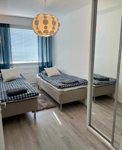 Postel nebo postele na pokoji v ubytování Luxury Riverside apartment in the city center
