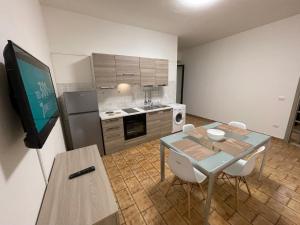 Η κουζίνα ή μικρή κουζίνα στο Zangaro Apartment