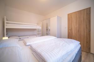 Posteľ alebo postele v izbe v ubytovaní Promenada Lipno Apartment 123