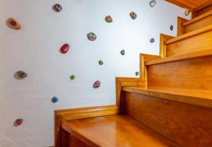 a group of rocks on a wall in a room at A Casa da Rapariga de Cabelo Azul in Manteigas