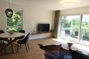 TV/trung tâm giải trí tại Ferienwohnung Amalie