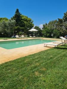 The swimming pool at or close to Masseria Fagà