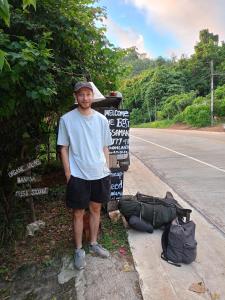 a man standing on the side of the road at Easylife Bungalow in Ko Lanta