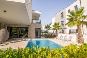 an image of a villa with a swimming pool at Villa FGstar in Murter