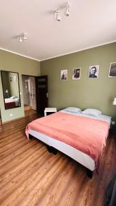 Posteľ alebo postele v izbe v ubytovaní Dworcowa - Apartament