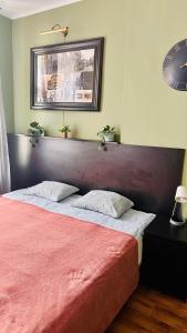 Posteľ alebo postele v izbe v ubytovaní Dworcowa - Apartament