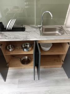 a kitchen with a sink and a counter at Neva Residence in Istanbul