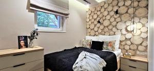 Postel nebo postele na pokoji v ubytování VIP APARTAMENTY Chałubińskiego APART