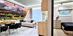 Posezení v ubytování VIP APARTAMENTY Chałubińskiego APART