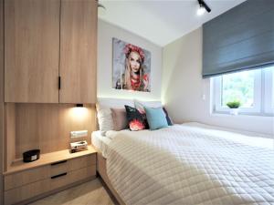 Postel nebo postele na pokoji v ubytování VIP APARTAMENTY Chałubińskiego APART