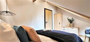 Postel nebo postele na pokoji v ubytování VIP APARTAMENTY Chałubińskiego APART