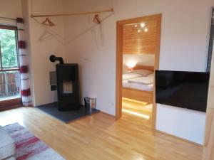 A bed or beds in a room at Appartement Moni / Golf & Ski - TOP 9