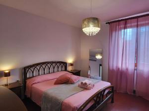 Postel nebo postele na pokoji v ubytování Appartamento con Camino in Centro Storico
