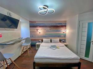 Posteľ alebo postele v izbe v ubytovaní Apartments on Chaykovskogo 16