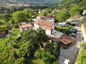 an aerial view of a house in a village at Agriturismo Mare e Monti in Tramonti