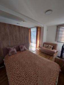 Postel nebo postele na pokoji v ubytování Apartman "LOLA" Kopaonik