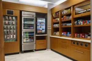 a kitchen with two refrigerators in a store at SpringHill Suites by Marriott Philadelphia West Chester/Exton in Exton