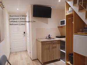 Kuchyň nebo kuchyňský kout v ubytování Loft House Budapest