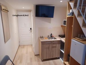 Kuchyň nebo kuchyňský kout v ubytování Loft House Budapest