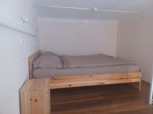 Postel nebo postele na pokoji v ubytování Loft House Budapest