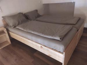 Postel nebo postele na pokoji v ubytování Loft House Budapest