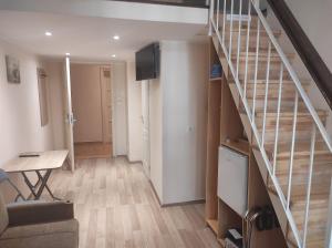 TV a/nebo společenská místnost v ubytování Loft House Budapest