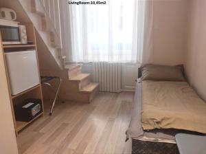 Postel nebo postele na pokoji v ubytování Loft House Budapest