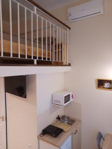 Kuchyň nebo kuchyňský kout v ubytování Loft House Budapest