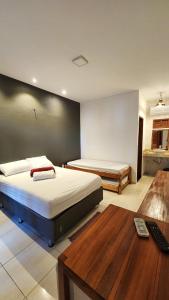 Llit o llits en una habitació de Pousada Vila Cajuína - Parnaíba