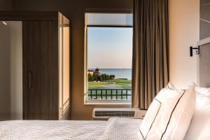 Postel nebo postele na pokoji v ubytování SpringHill Suites by Marriott Dallas Rockwall