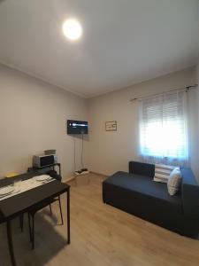 TV a/nebo společenská místnost v ubytování Casa Cris - Torre Pellice-TO-