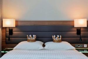 Ein Bett oder Betten in einem Zimmer der Unterkunft MOXY Vienna Airport