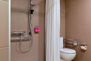 Ein Badezimmer in der Unterkunft MOXY Vienna Airport