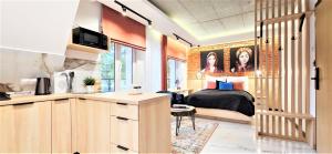 Kuchyň nebo kuchyňský kout v ubytování VIP APARTAMENTY Chałubińskiego APART + 37 fotografií