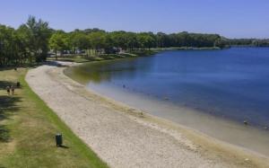a path next to a body of water at Boerderij appartement De Casterie in Bornerbroek