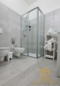 a bathroom with a shower and a toilet and a sink at Mé Besito in Ari +34 photos