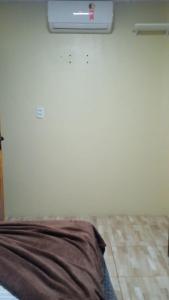 Cama ou camas em um quarto em Kitnet Rioli