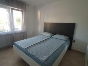 Ліжко або ліжка в номері Apartman Amal