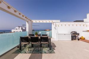 En balkon eller terrasse på A&N Atico Vista al Mar