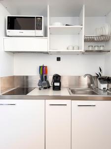 Una cocina o zona de cocina en Oro y Luz