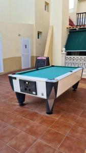 a pool table sitting on top of a floor at Mariposa Azul in Adeje