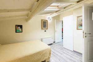 Letto o letti in una camera di B&B Casa Rossa