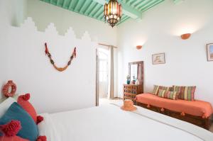 Postel nebo postele na pokoji v ubytování Riad l'Ayel d'Essaouira
