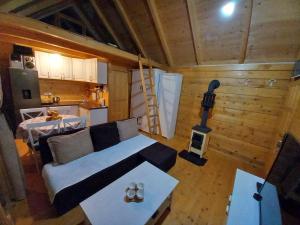 an overhead view of a living room and kitchen in a cabin at LAKE VIEW PREVLAKA in Cetinje